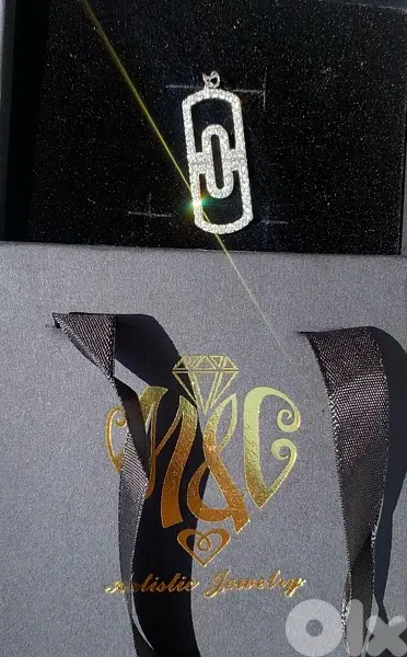 Diamond pendant bulgari style.