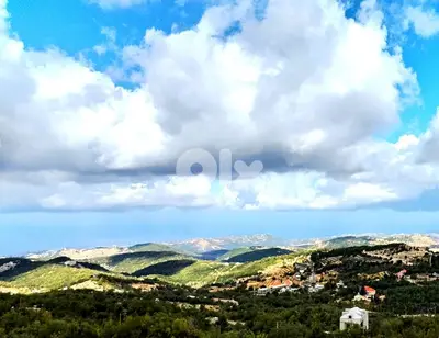 Land for sale in Mechmech Kfarsama Street أرض للبيع في مشمش طريق عام