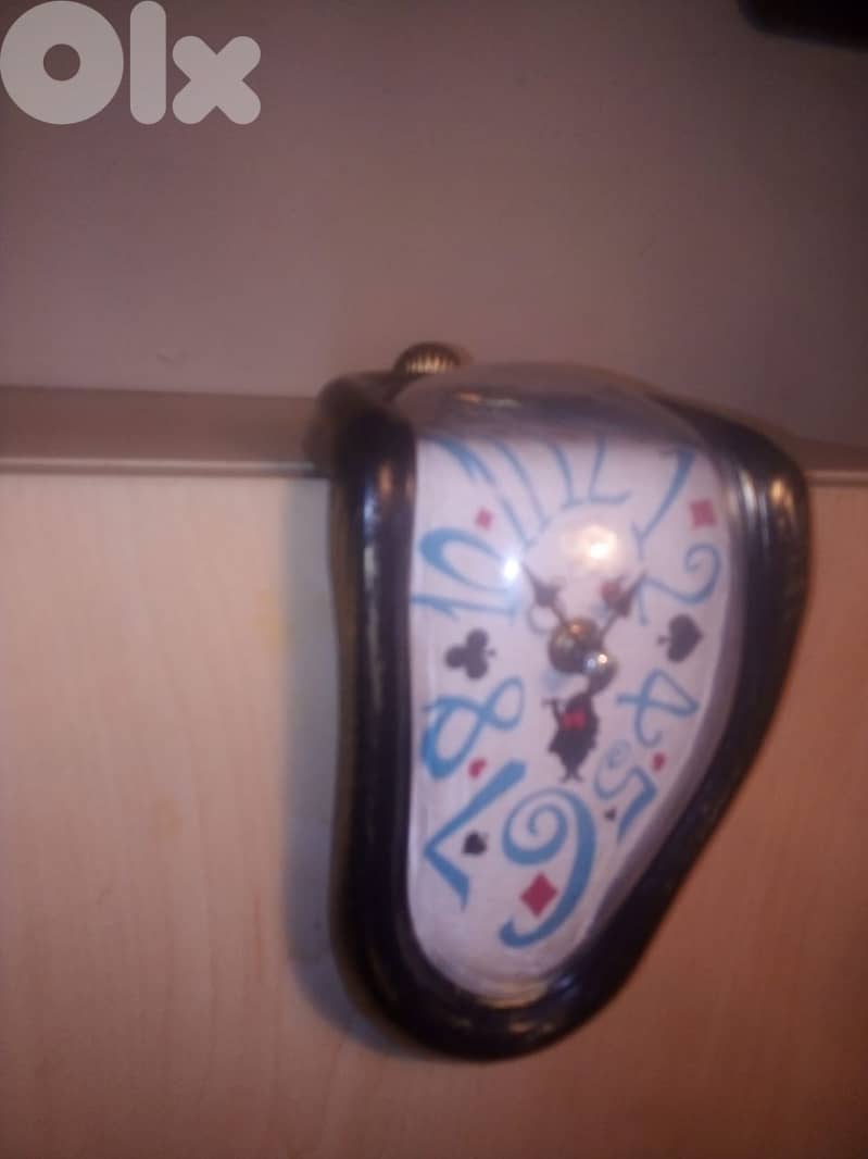 Melting clock inspired by the art of Salvador Dali. decorative clock 1