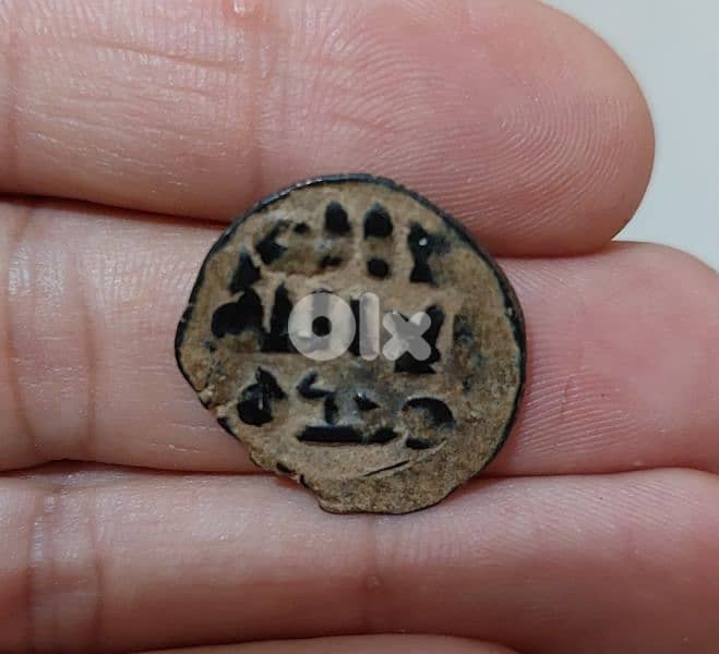 Ancient Ummayid Islamic Bronze Coin of Abdul Malik year 77 AH /696 AD 0