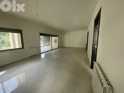 RWK144JS -  Apartment For Sale In Ballouneh - شقة للبيع في بلونة