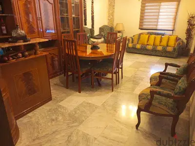 full living room with bar and dining room