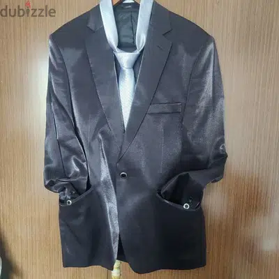 a suit used for one time only with its tie made in turkey ليوم واحد