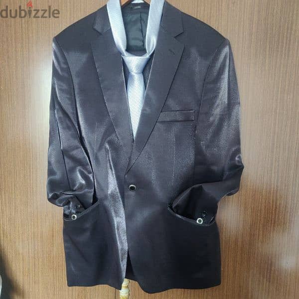 a suit used for one time only with its tie made in turkey ليوم واحد 0