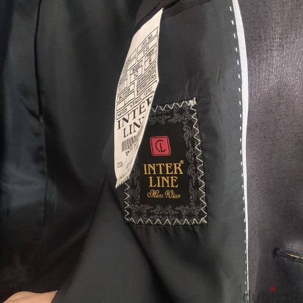 a suit used for one time only with its tie made in turkey ليوم واحد 1