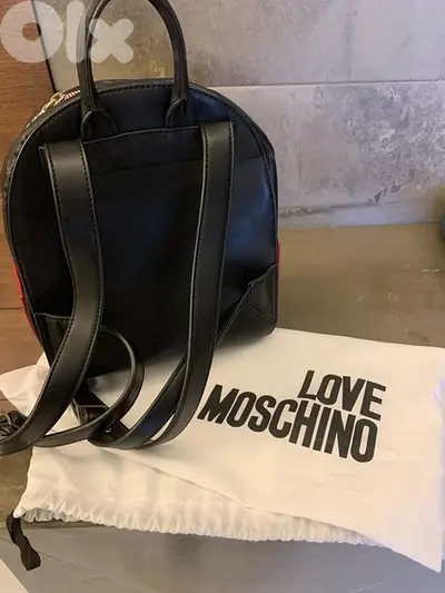 Real leather Moschino hand and backbag