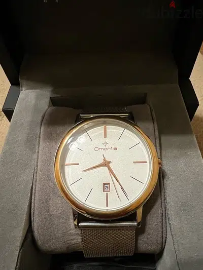Silver and Gold Watch / ساعة فضية  و ذهبية