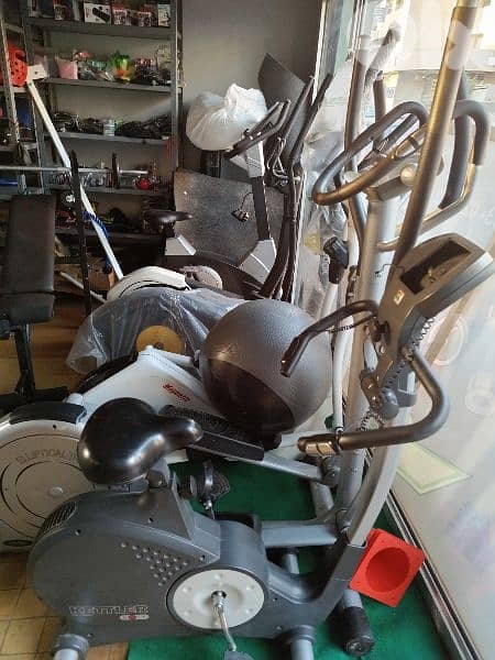 Cardio burning fat 4 in1 elliptical and bike machine plus dumbells 2