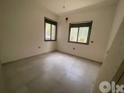 RWK132IY - Apartment For Sale in Ballouneh - شقة للبيع في بلونة