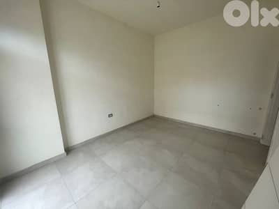 RWK132IY - Apartment For Sale in Ballouneh - شقة للبيع في بلونة