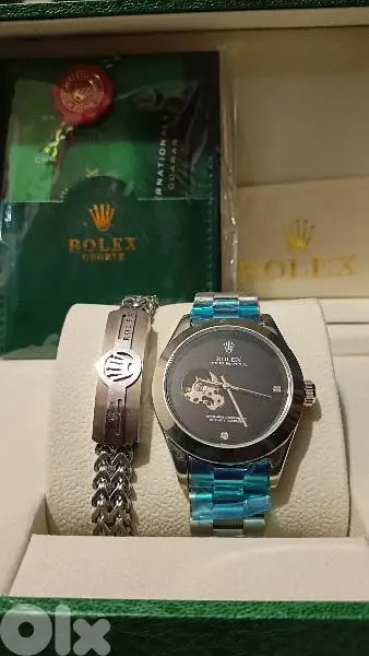silver rolex watch
