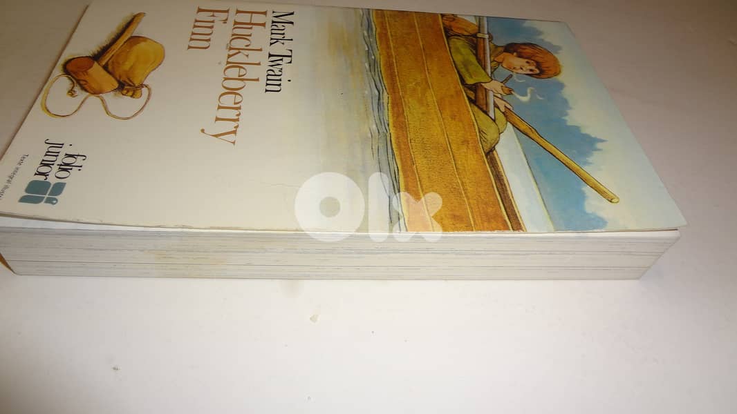 Mark Twain s "Huckleberry Finn" book 1