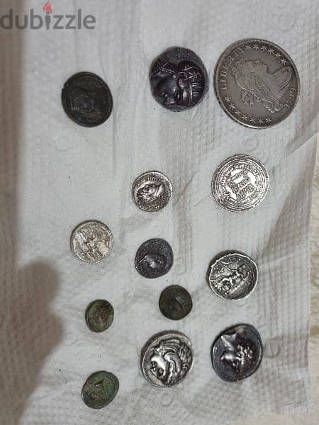 A silver collection of ancient  coins gram 15 dollars 0