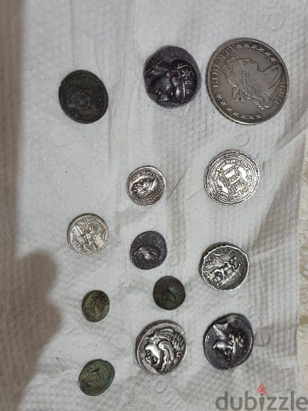 A silver collection of ancient  coins gram 15 dollars 1