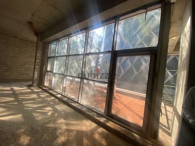 Large corporate office open space with garden