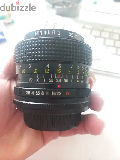 2 Nikon SLR  Lenses - 2 Panasonic i think G40 Lenses