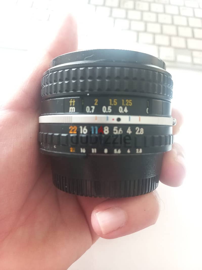 2 Nikon SLR  Lenses - 2 Panasonic i think G40 Lenses 3