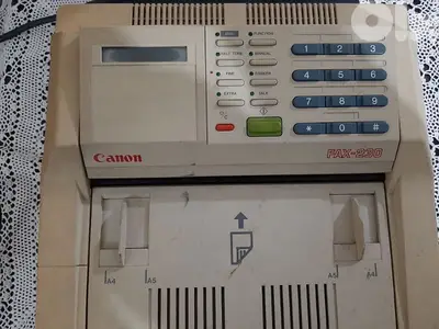 فاكس Fax Canon Japan مع لفات ورق وشبك وكتلوك. .