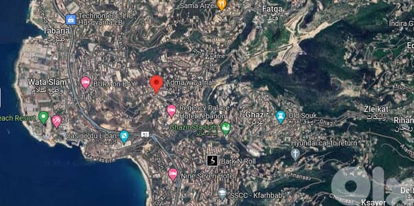 A 22,000 m2 land for sale in Adma - أرض للبيع في أدما