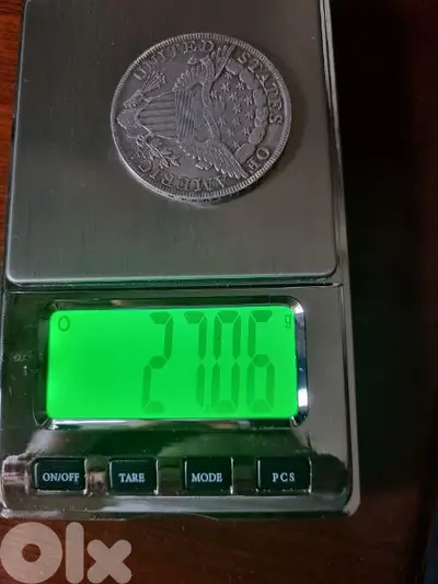 A silver old coin 15 dollars the gram A silver old coin 15 dollars the gram