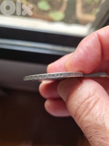 A silver old coin 15 dollars the gram 3