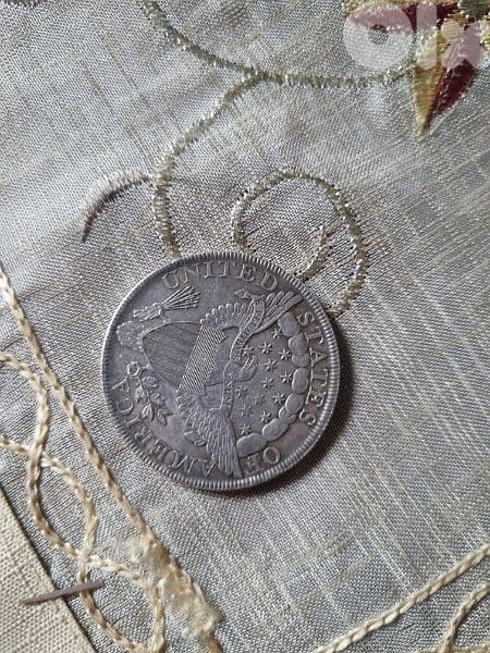 A silver old coin 15 dollars the gram 5