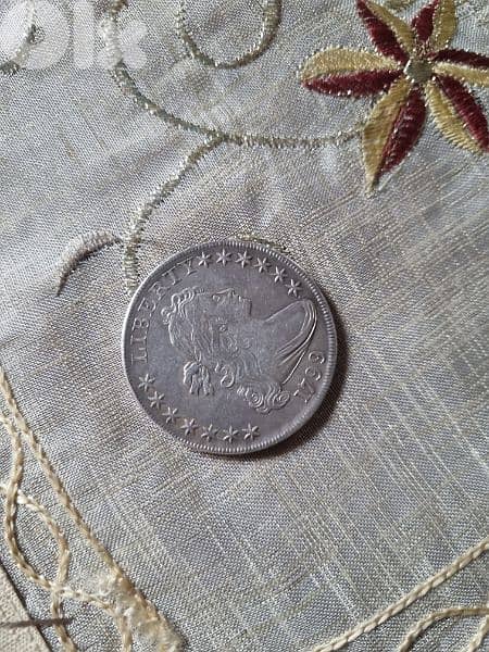 A silver old coin 15 dollars the gram 6