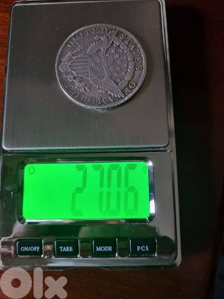 A silver old coin 15 dollars the gram 9