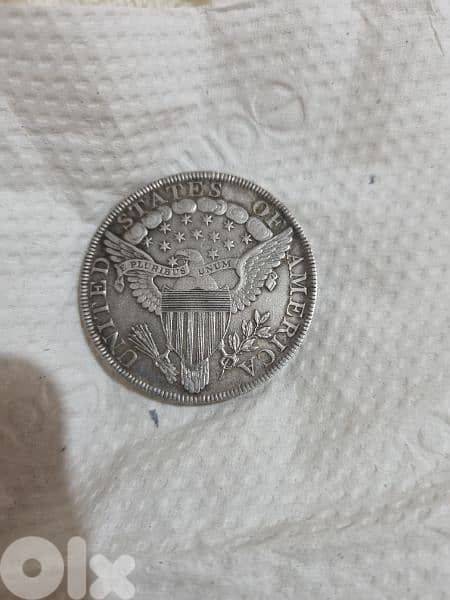 A silver old coin 15 dollars the gram 11