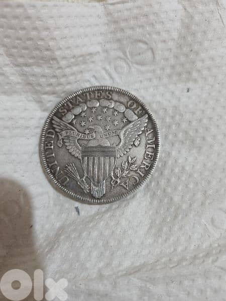 A silver old coin 15 dollars the gram 14