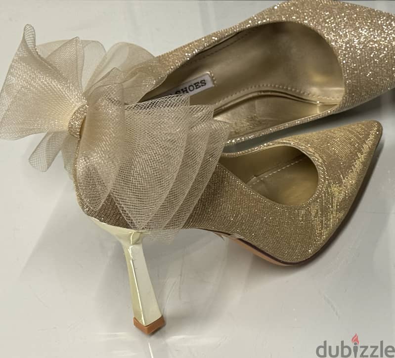 Hand and showlder bag; gold color and high quality. sac 10