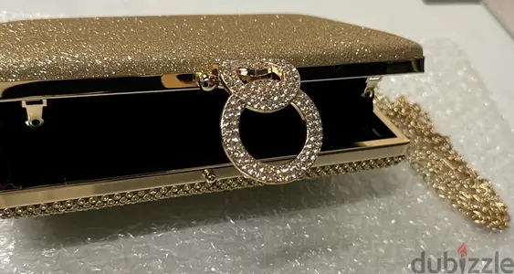 Hand and showlder bag; gold color and high quality. sac