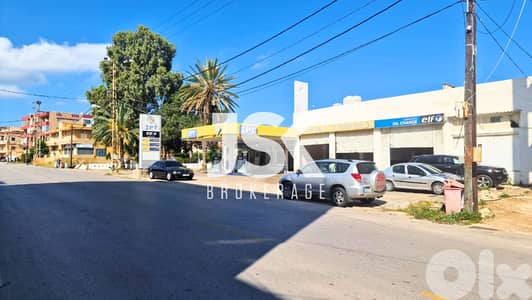 L15302-Land with a Gas Station for Sale On Chekka Main Road