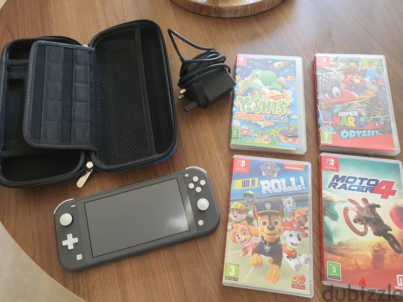 Nintendo switch lite+ 3 games like new 0