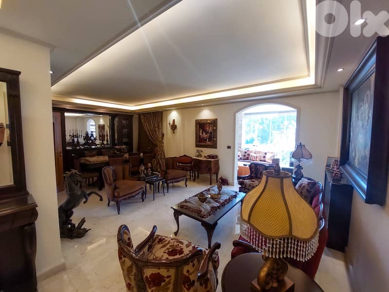 160 SQM Furnished Apartment in Qornet El Hamra with Mountain View 0