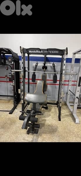 Multifunction machine nordictrack with bench like new 2