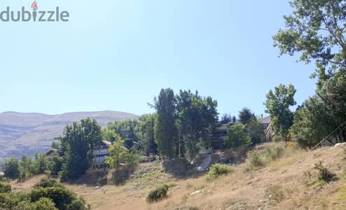 Land on Tilal El Aassal highway for sale