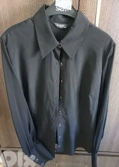 A Black Long Sleeves Shirt