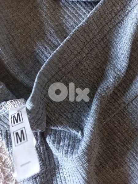 A Medium Size Gray Crop Top 2