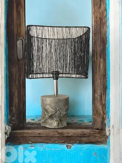 Concrete lamp base with steel wire shade