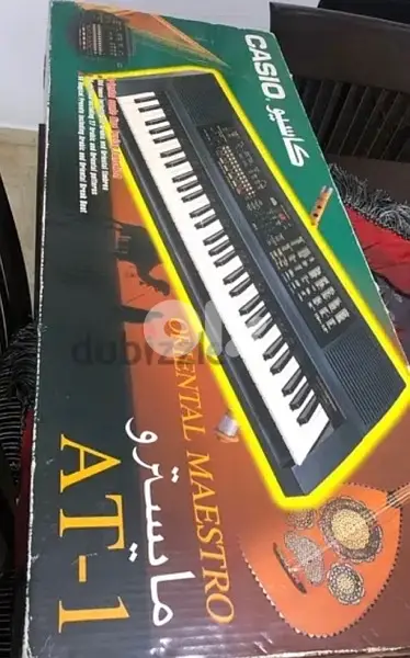 CASIO AT-1 Keyboard. +Stand+Book holder/original box
