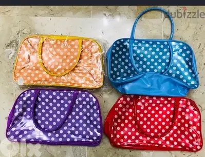 Four colourfull handbags. . . Selling all together