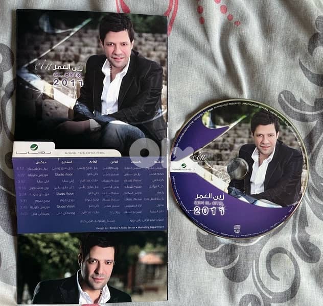 two cds original with no cover : zein el omor& amal hijazi both 5 $ 2
