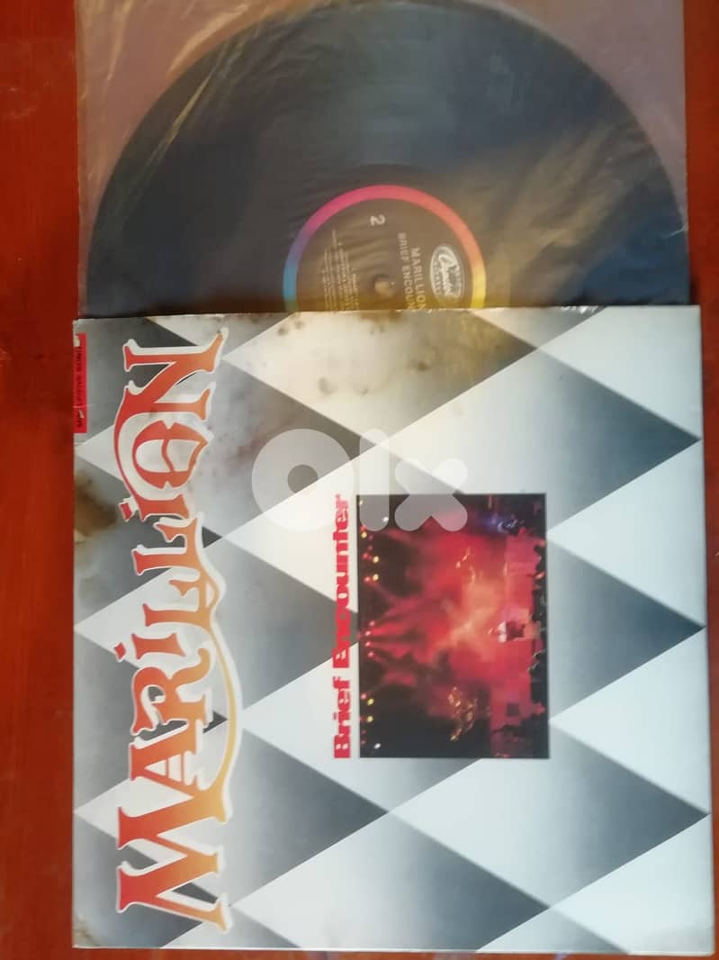 Marillion "Brief encounter" vinyl  cover have some stains vinyl vg 0