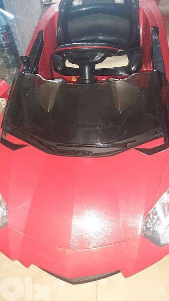 Electric kids car red very good condition 1