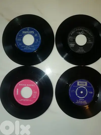 45t 7" vinyl any for 300k LL in v good cond