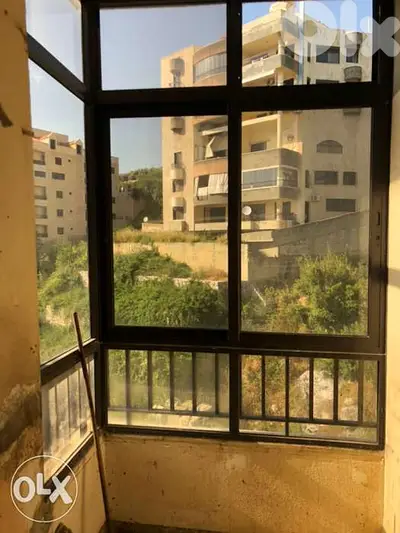 واجهة الومينيوم لون بني عرض ٢٢٥ x ارتفاع ٢٢٨