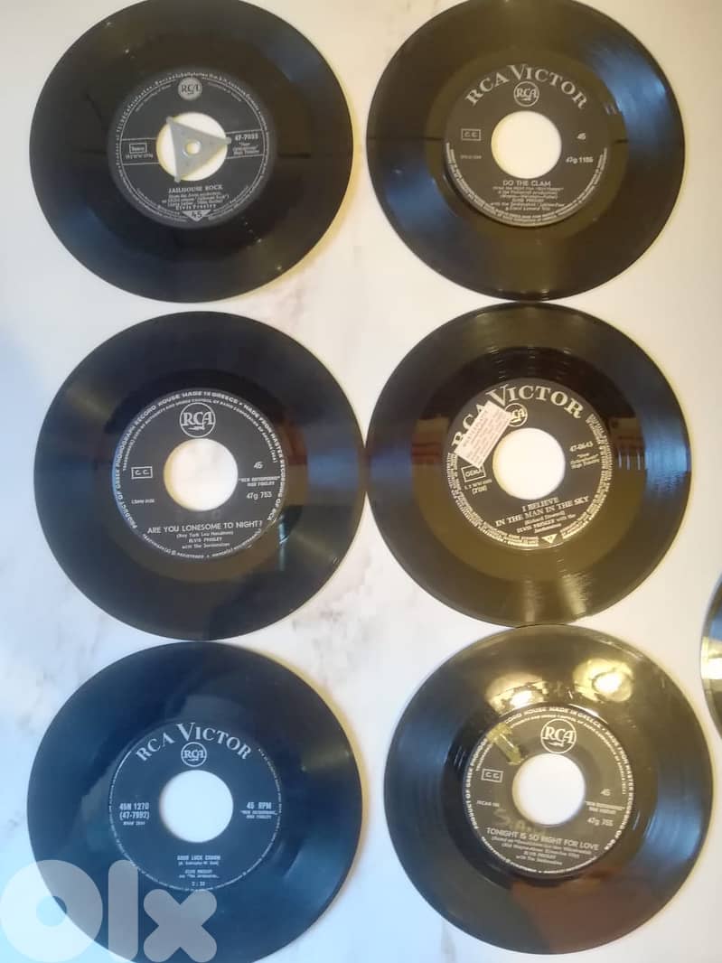 Elvis Presley 7 45t 7" vinyl collection sold together in v g cond 0