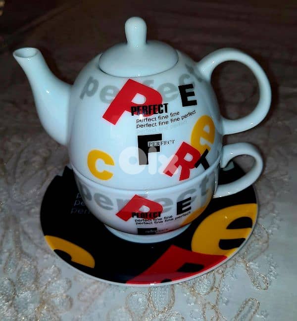 original tea cup with tea pot 0