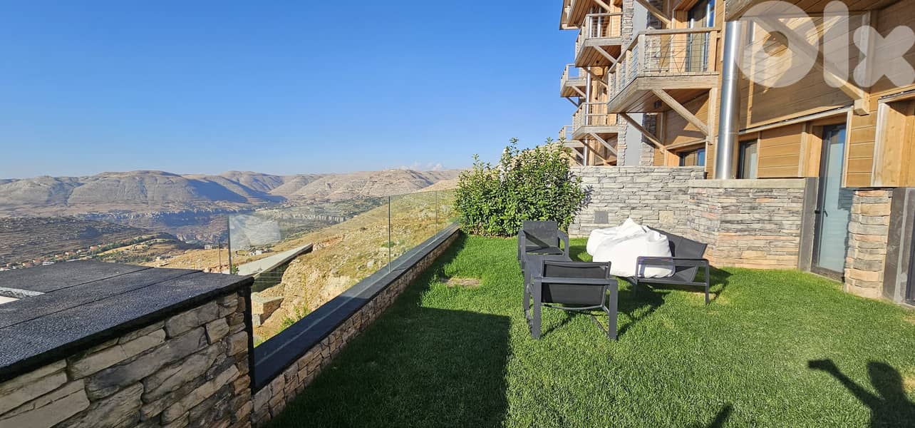 RWK197GZ - Triplex Chalet For Sale In Tilal Faqra With Garden 1